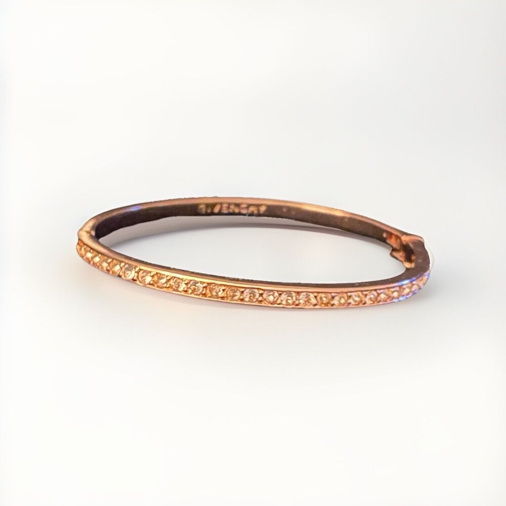 ...GIVENCHY...Rose Gold Tone Rhinestone Crystals Oval Hinged Bangle Bracelet...